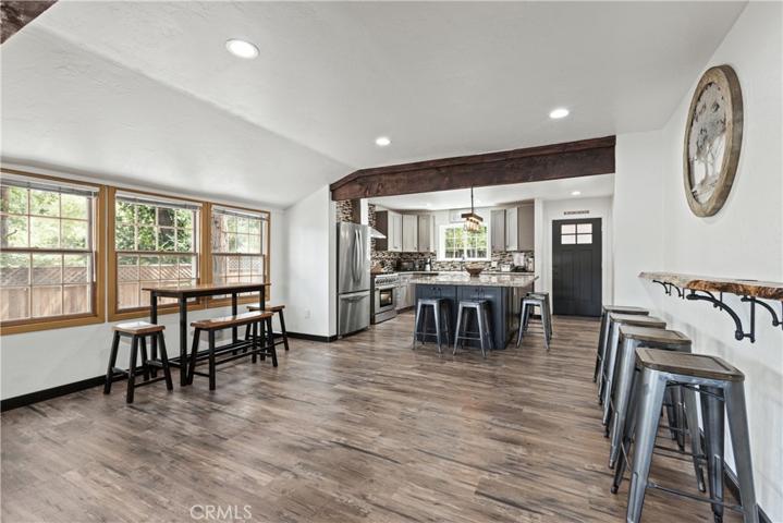 Open Floor-plan, custom Redwood bar.
