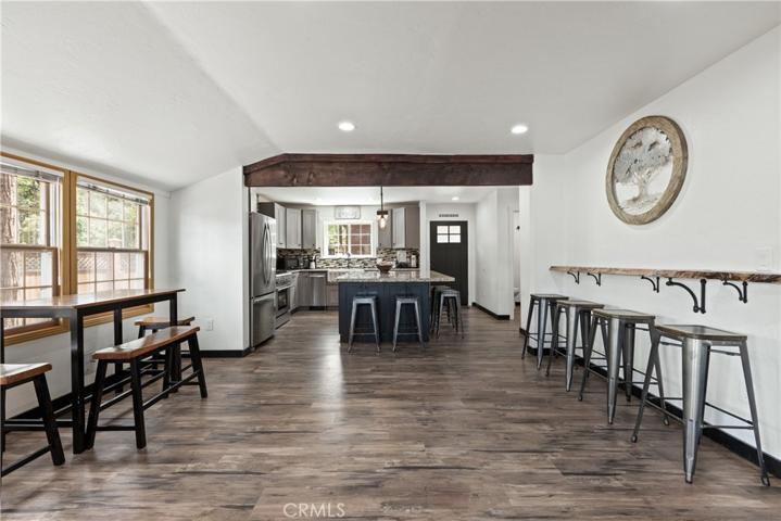 Open Floor-plan, custom Redwood bar.