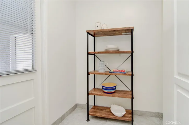 Additional room adjacent to kitchen could be an AWESOME pantry...also laundry hook ups are right on the other side of the wall...so this could be a great inside laundry room.