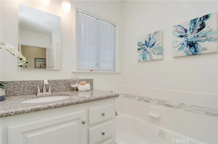 Beautiful designer details in this wonderful bath with bathtub and separate shower.