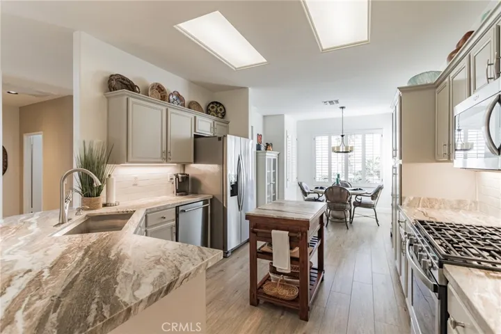 GORGEOUS COUNTER TOPS AND CUSTOM PAINT CABINETS