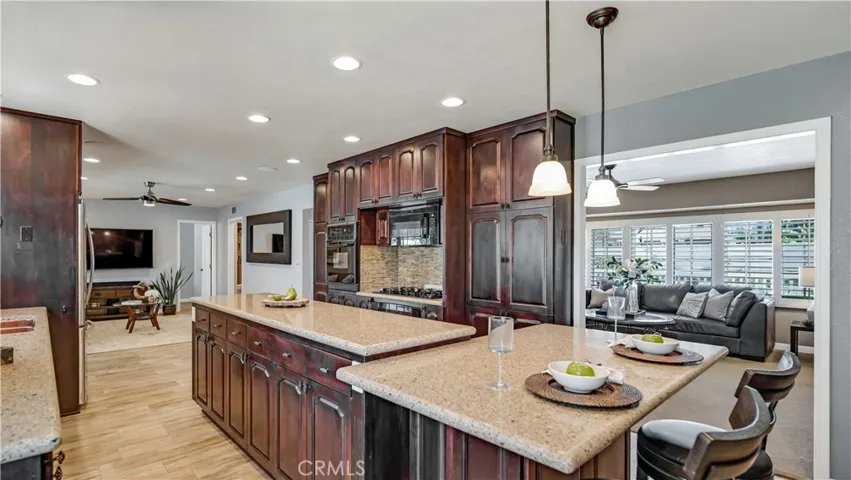 This large kitchen opens to the living room at right and dining/family room straight ahead