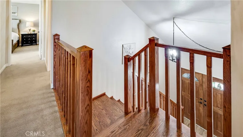 This wood staircase adds to the charm of this solid built home