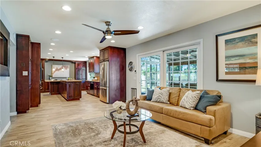 This open area blends into the outdoor patio for indoor-outdoor living