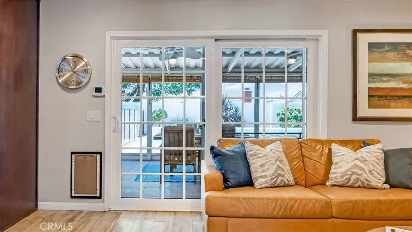 Built in wall doggie door leads to enclosed porch
