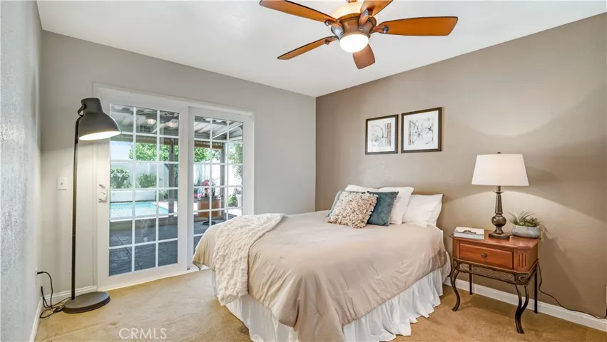 The downstairs bedroom has direct access to the backyard
