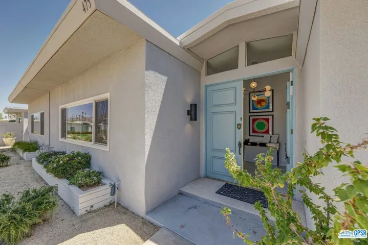 Smart upgrades have been made throughout this spacious 2-bedroom unit in the iconic midcentury Villa Roma community, now up for historic designation status.