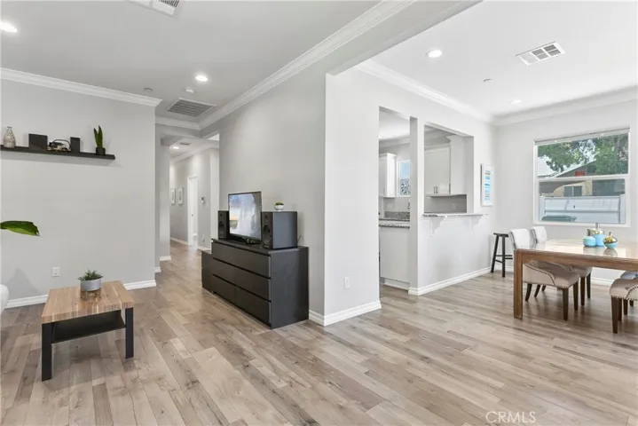 Open concept living room, dining and kitchen.