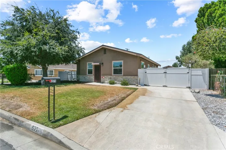 Huge front yard and oversized driveway.