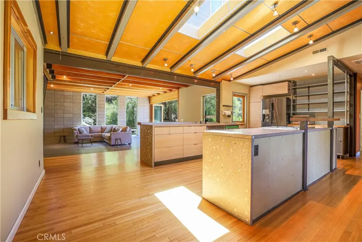 Kitchen and living room in the background
