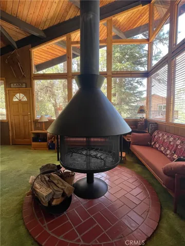 Vaulted ceilings and a wall of windows for views views views!!