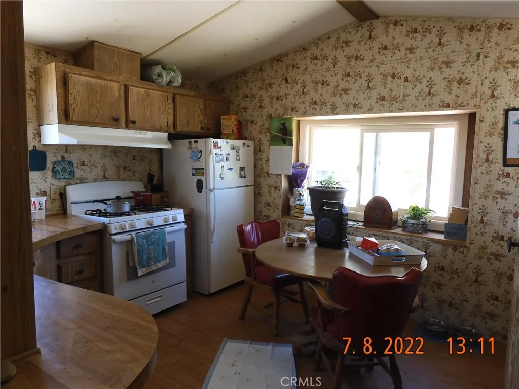 Kitchen has lots of cabinets.  Range/oven stays and is fairly new.