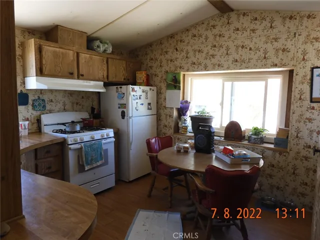 Kitchen has lots of cabinets.  Range/oven stays and is fairly new.