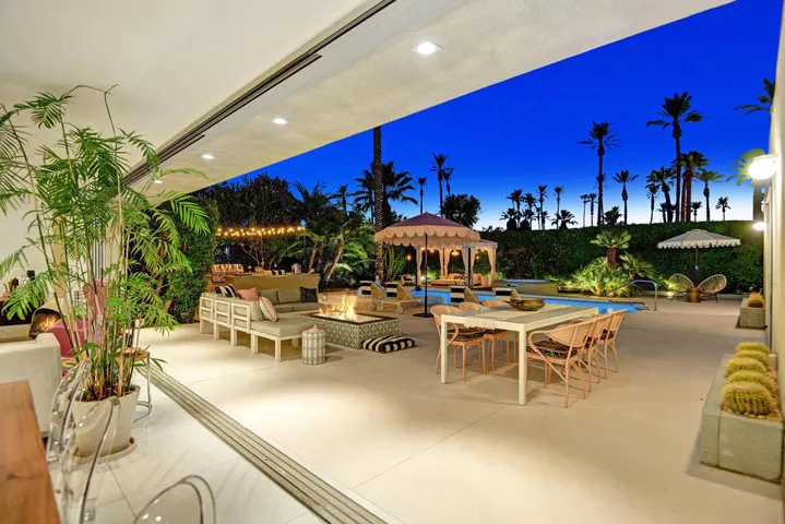 RETRACTABLE DOOR OUT TO POOL YARD NIGHT