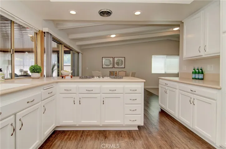 Plenty of bright white cabinetry and prep space.