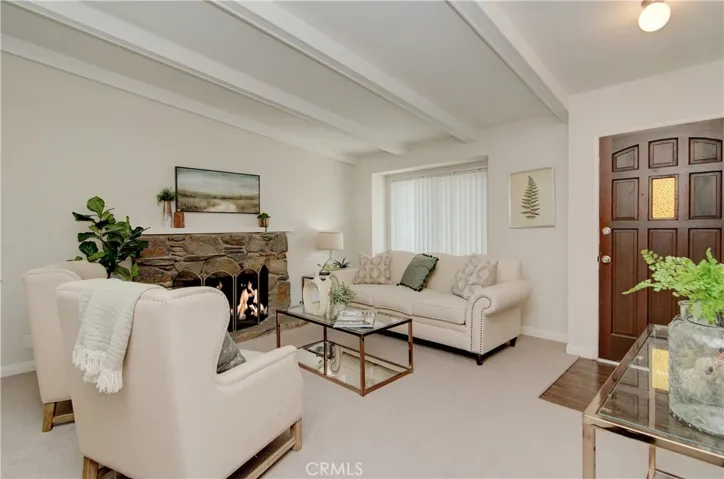 Contemporary white beams add nice touch.