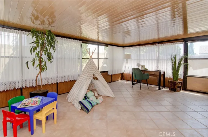 Enclosed patio room adds loads of additional space for many options...playroom...office...exercise...what works for you?