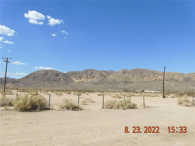 View of nearby mountains across the street from the lot.
