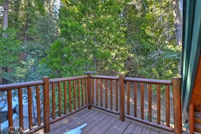 Deck off the master with waterfall