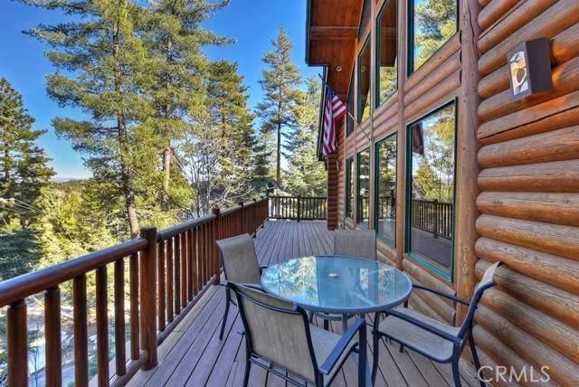 large wraparound deck off kitchen and living room