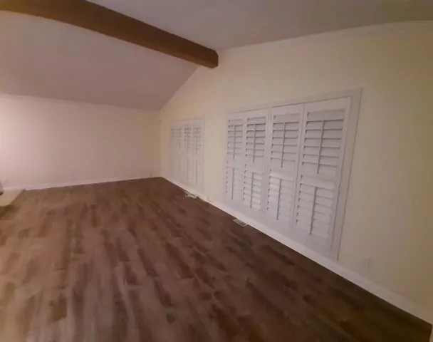 Living Room wood beam French windows