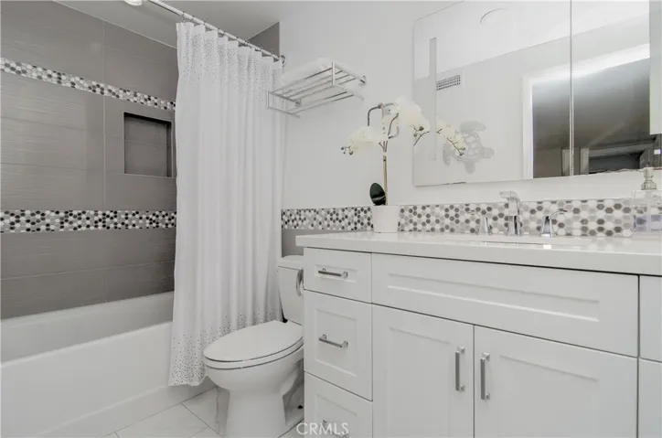 Gorgeous upstairs hall bath with designer details.