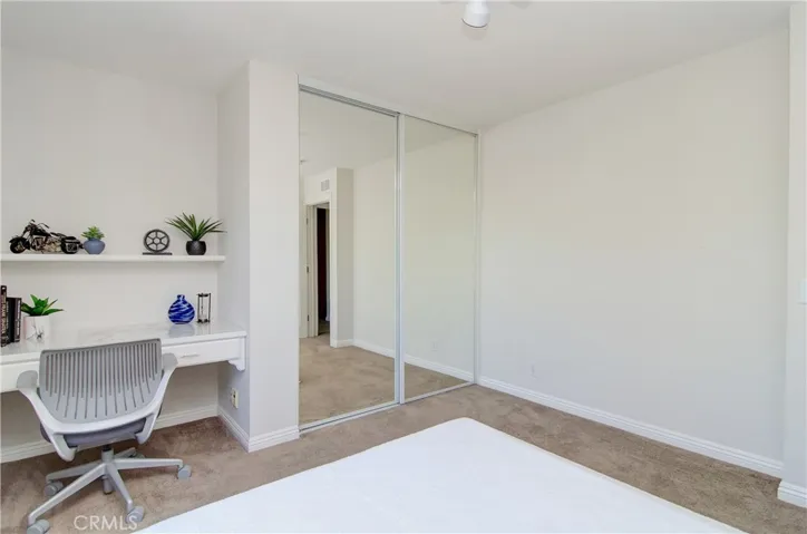 Desk space could easily become additional closet.