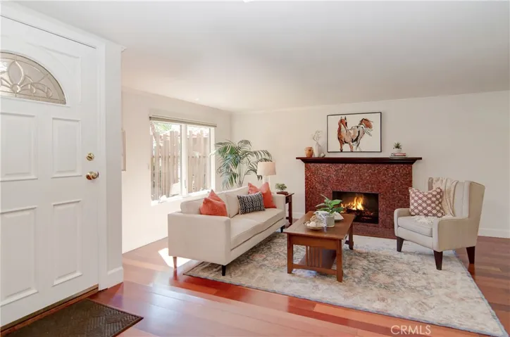 Custom fireplace is a cozy place to hang out on cool evenings.