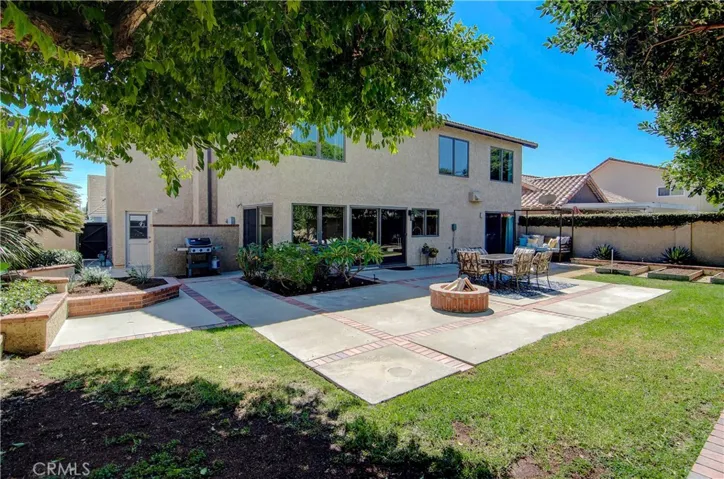 This huge back yard has loads of space for family, pets and entertaining...or pool...or garden...or all of the above!