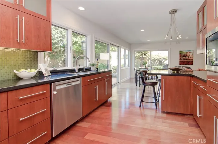 Walls of glass bring the outside in, along with soooo much natural light...beautiful!