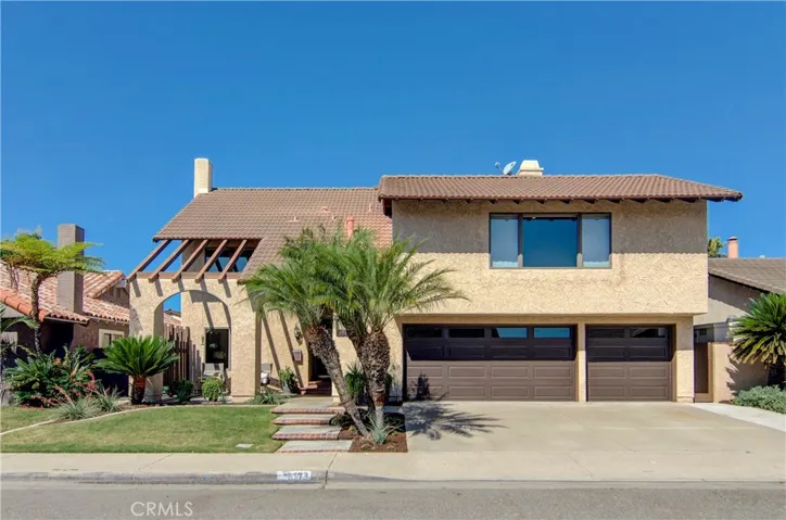 This large family home is located on a quiet inside tract location with community pool nearby.
