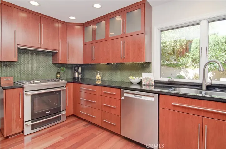 Custom features everywhere...plus a lovely view from the kitchen sink...every cooks dream!