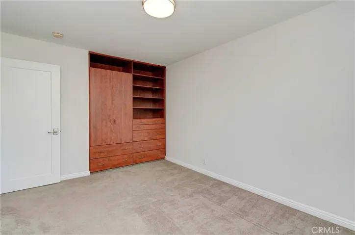 Another guest/kids bedroom with organized closet.