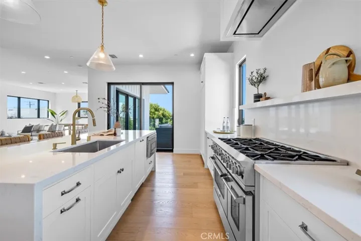 Big 48 Inch Blue Star Range and Wolf ceiling mount range hood
