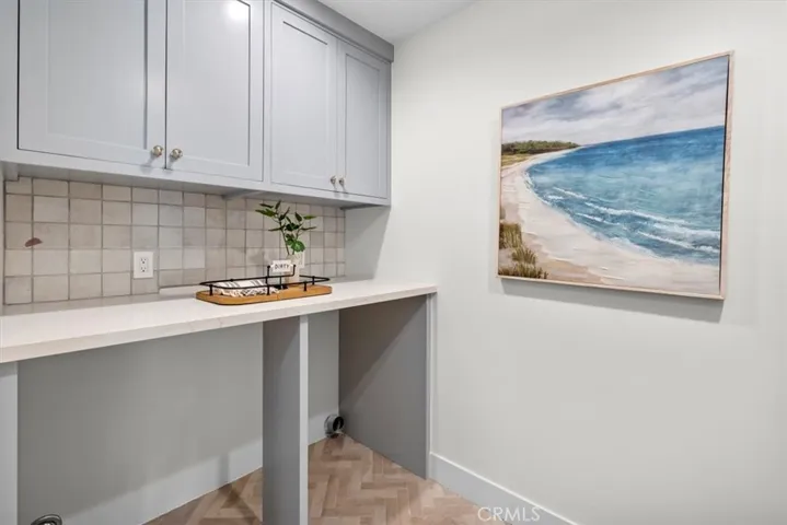 Laundry Room with the herring bone floor tile
