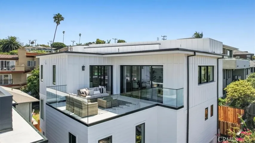 Exterior view of those big windows, and the James Hardie Fiber Cement Board