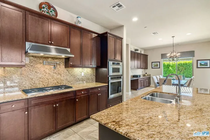 Cooktop with pot filler