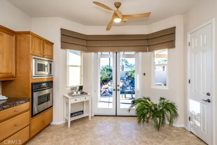 Kitchen with double door access to the patio.