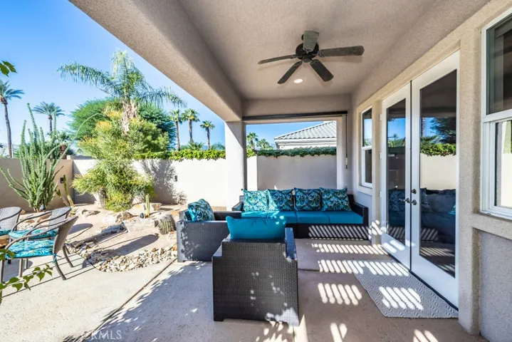 West view of the covered patio outside the master bedroom.