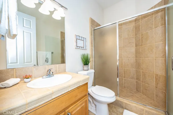 Attached walk in shower bathroom to the first bedroom.