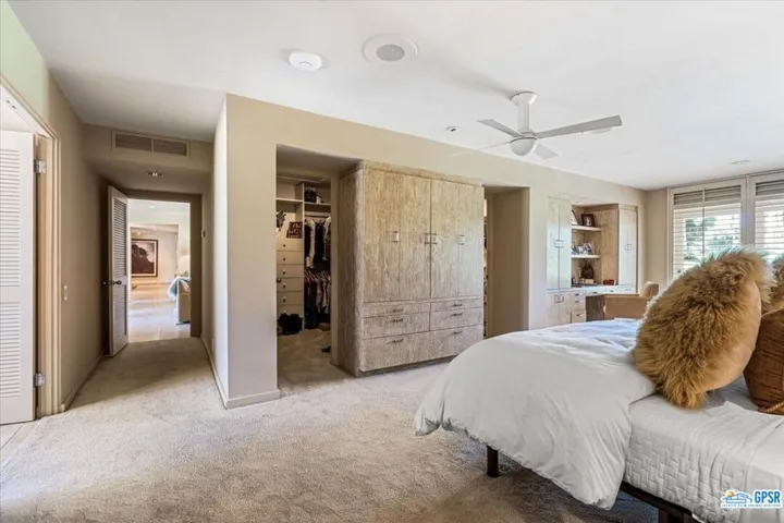 ...built in TV cabinet with 2 Walk-in closets!