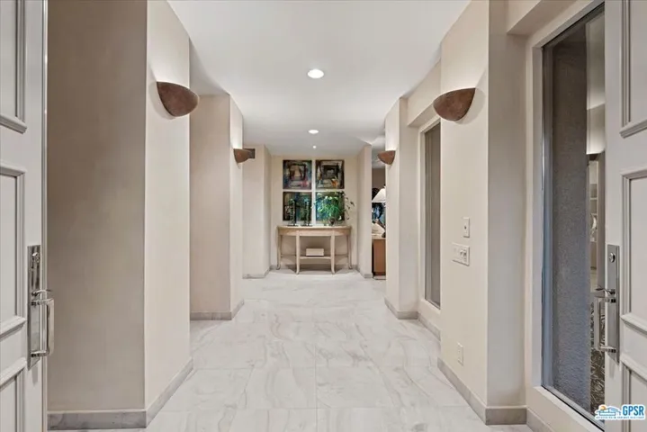 ...Welcome you to this formal entry hall