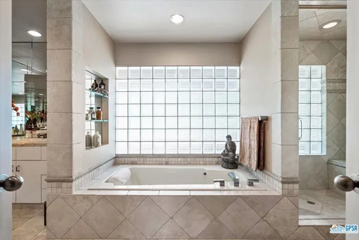 Primary suite bath with jetted tub...