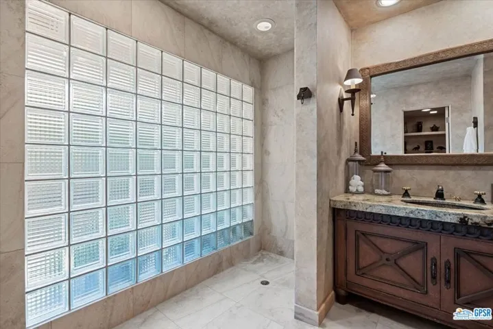 Guest bath has accessible shower