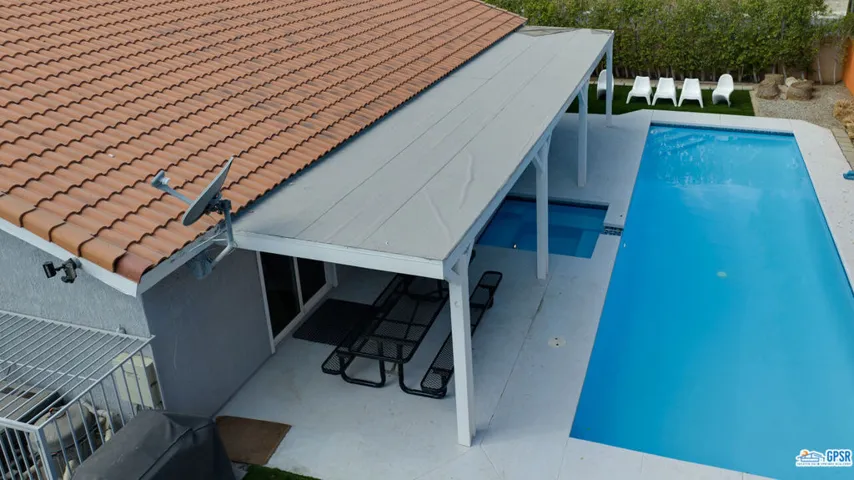 covered patio and spa