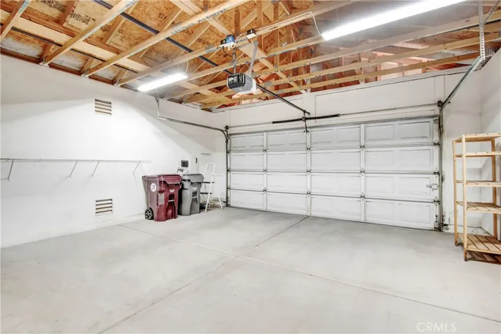 View of 2 car attached garage.
