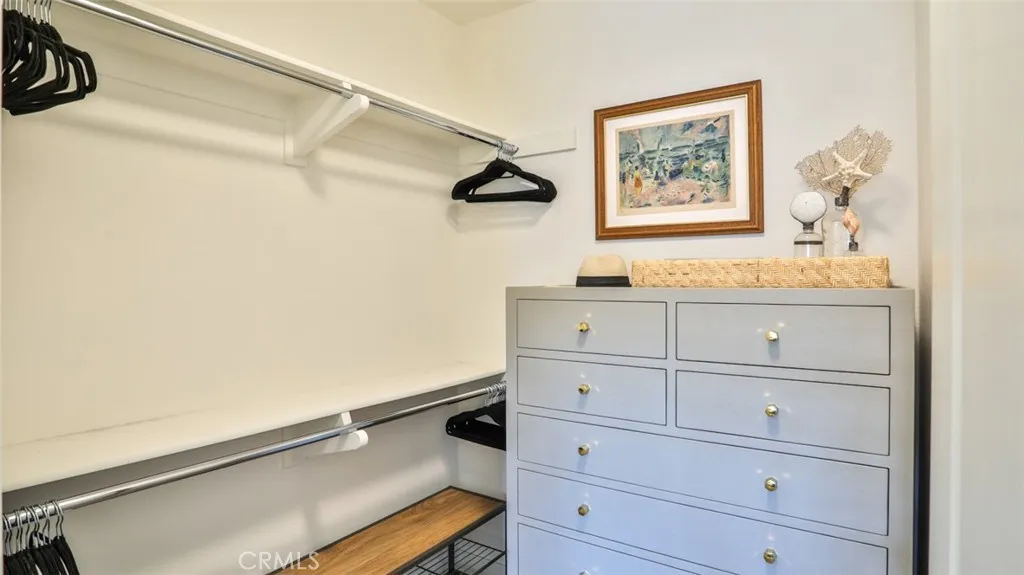 Walk-in closet at primary suite