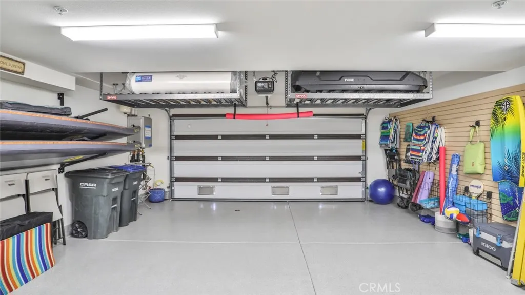 2-car garage, clearance for a car is 77”.