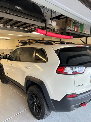 2-car garage, clearance for a car is 77”.
