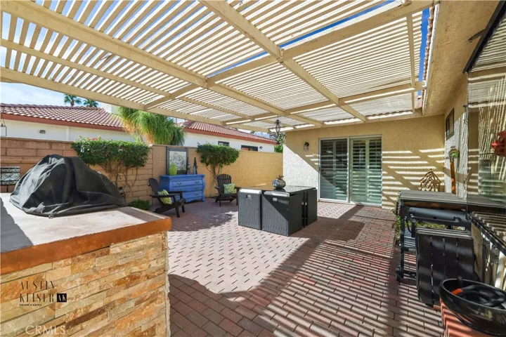 Side patio with barbecue area